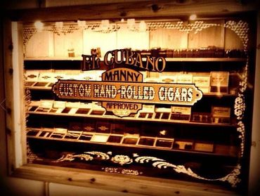 window in front of humidor at el cubano