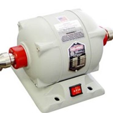 A white electric bench grinder with red accents and a power switch.