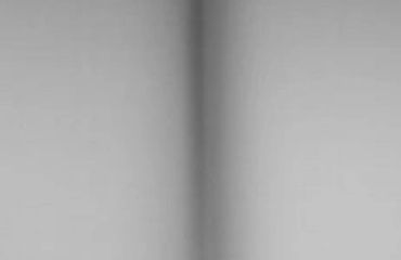 Roller shades in bedroom, Orange County