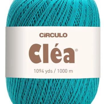 A teal color ball of Clea yarn from Circulo Yarn.