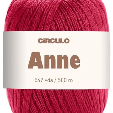 A red ball off Ann Yarn that is a mercerized cotton from Circulo Yarn
