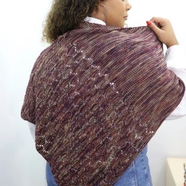 A hand knit shawl made from Lucky Feet yarn from Circulo Yarn,
