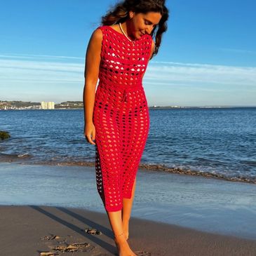 A red dress knit with Charme yarn from Circulo Yarn.