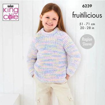 A girl wearing a sweater out of Fruitilicious yarn from King Cole.