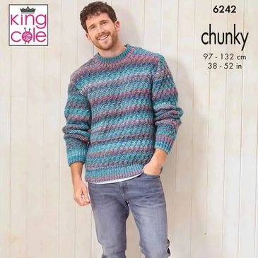 A man wearing a sweater knit out of Cottagespun Chunky yarn from King Cole.