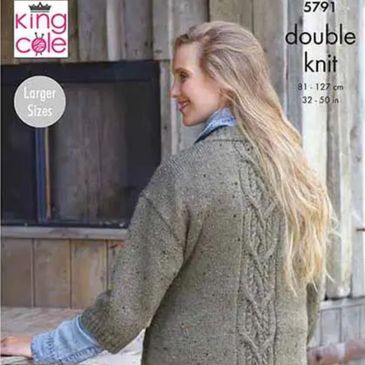 A woman wearing a sweater knit out of Homespun DK from King Cole Yarn.
