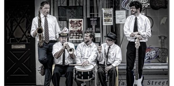 A black and white photo of a Dixieland jazz band