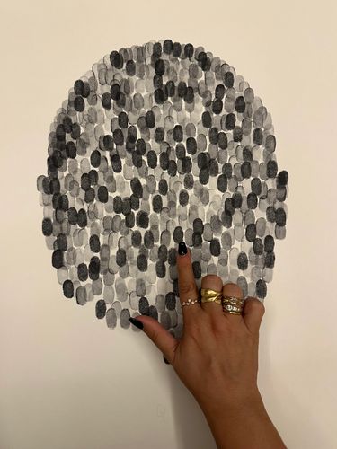 Zhaleh Farhoumand Fingerprint Artist painting with her finger