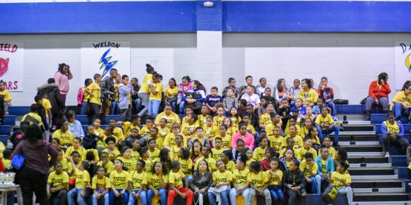 A Crowd of Children in a Gym