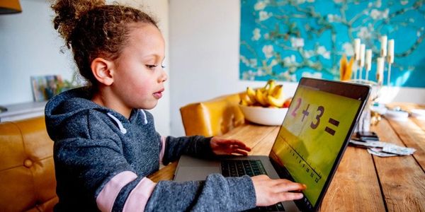A Child With Her Laptop