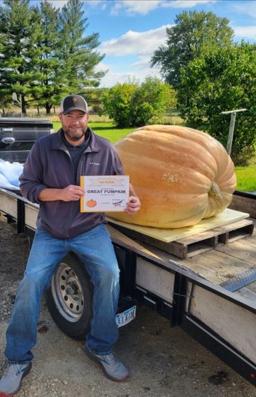My largest pumpkin grown to date. 1,075 lbs.