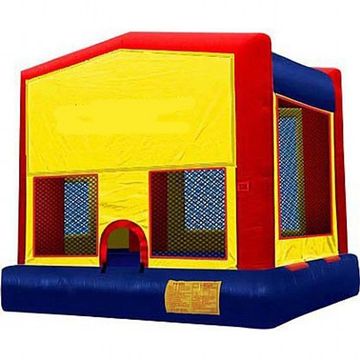 Classic red, yellow, and blue bounce house rental by Monkey Giggles perfect for kids' parties