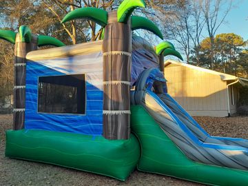 Splash Down Lagoon bounce house with slide, hoop, and splash pad perfect for kids under 8