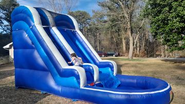 Water slide with splash pool rental from Monkey Giggles, perfect for summer parties