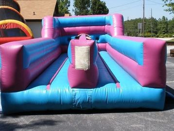 Pink and blue inflatable bungee run game rental, great for school events, parties, and team-building in Metro Atlanta.