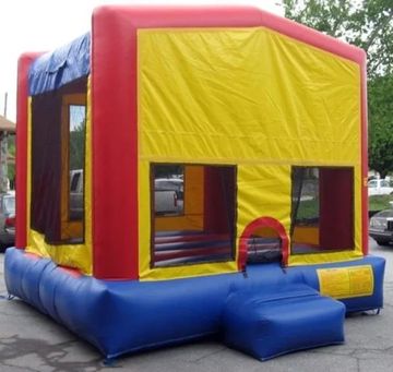 Colorful red, yellow, and blue bounce house rental from Monkey Giggles in Gwinnett County Metro Atl
