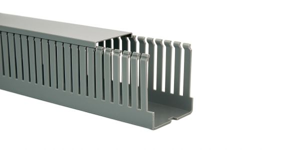 Gray plastic cable duct with removable cover for wire management.