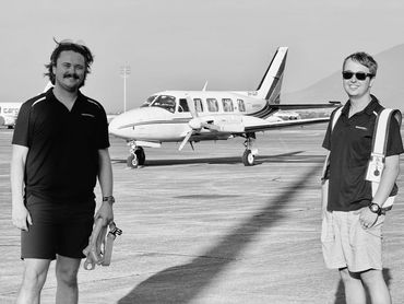 Alex Bartlet and Bradlee Smith with there Piper Chieftain wearing Aeroferry uniforms after working o