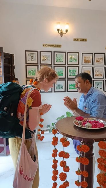 Welcoming with garland and namaste!