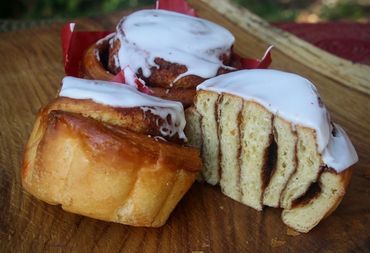 Tany's Cinnamon Roll- Soft & fluffy, rolled up snug with cinnamon, topped with a sweet icing.