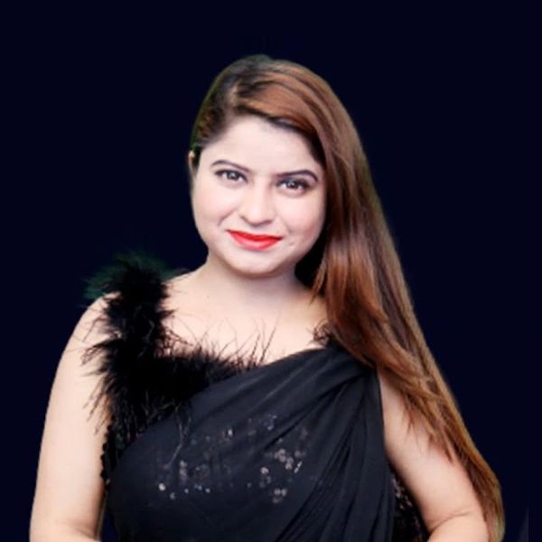 Woman in elegant black dress with long hair and bright lipstick.