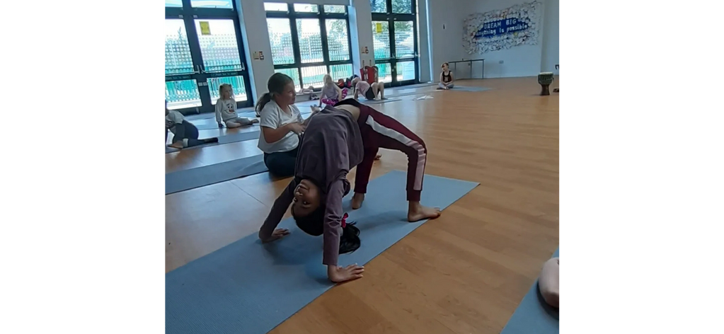 Image of child in full wheel.