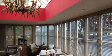 Venetian blinds in windows of a restaurant.  Commercial window treatments in Omaha & beyond