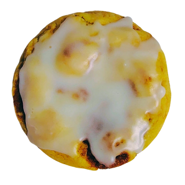 A cookie topped with melted white chocolate.