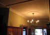 Ceiling repaired & painted, wallpaper hung above plate rail