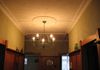 Ceiling repaired & painted, wallpaper hung above plate rail