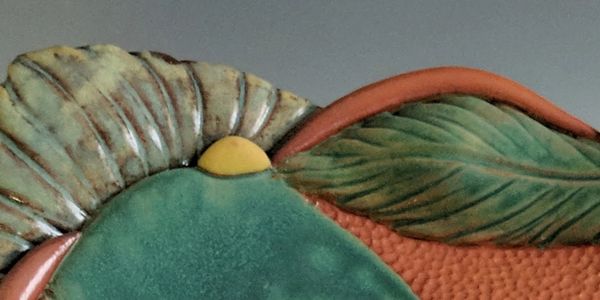 Detail from large green platter