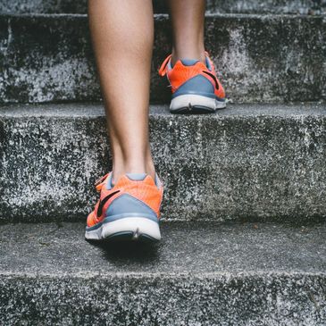 Woman exercising on the stairs