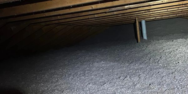 Blown in cellulose for attic insulation.
