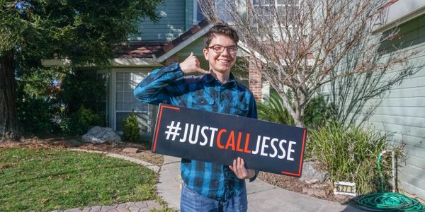 Young man celebrates closing on his first home.