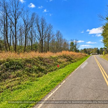 Paved NC Highway 10 frontage beside wooded land for sale in Cleveland County NC