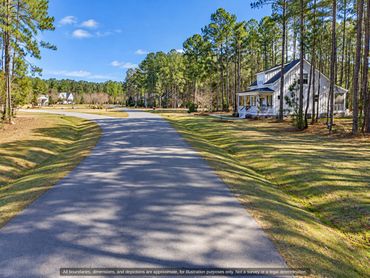 Quiet paved streets and established homes in Arlington Place, Minnesott Beach NC