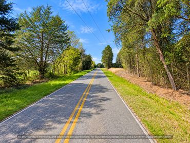 Paved road frontage leading to land for sale near Chapel Hill NC