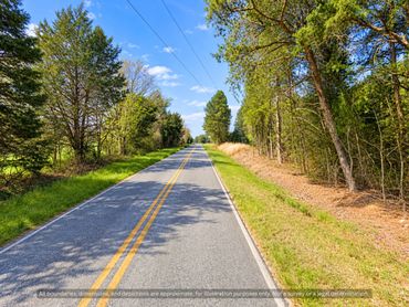 Paved country road access to Orange County NC acreage for sale