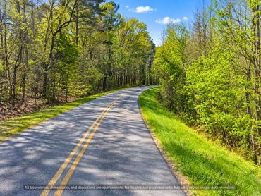 Scenic wooded drive near the Haw River and Saxapahaw NC, land for sale nearby