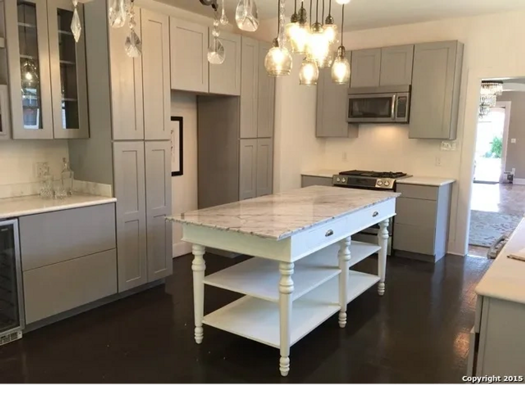 kitchen renovation Williams Sonoma Larkspur marble top kitchen island pottery barn paxton pendant