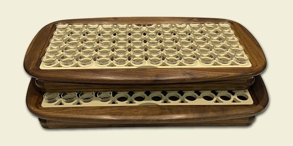 Image of stacked wooden communion serving trays
