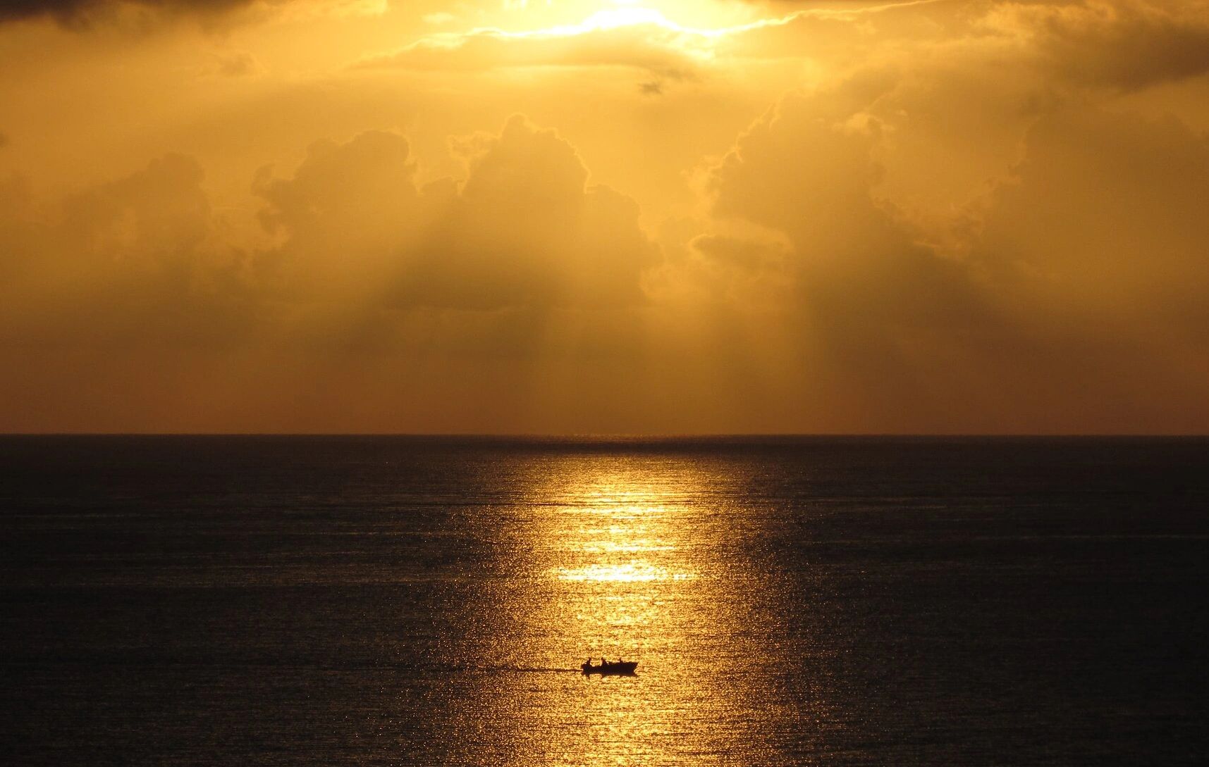 "Before Dawn" fishermen on the water. Jamaica, 2012. Copyright © Lance Winkel, 2024