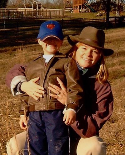 Lisa Reagan and her son on their farm in Virginia in 2003.