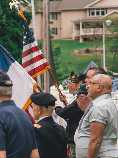 Close Image of People Holding Flags