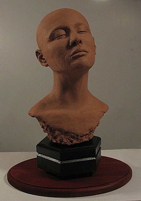 sculpture, plaster cast of bald womans head, Eve, another front view