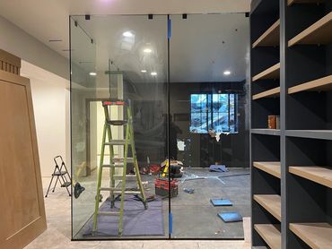 Custom glass for a home gym in a remodeled Kalispell home. Custom glass project by Precision Glass