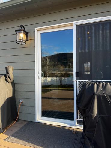 New glass replaced in a sliding door for a Precision Glass Kalispell window glass repair customer