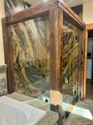 Custom glass shower enclosure for a Precision Glass client in Lakeside with custom glass & hardware