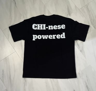 Black T-shirt with 'CHI-nese powered' text in white on the back.