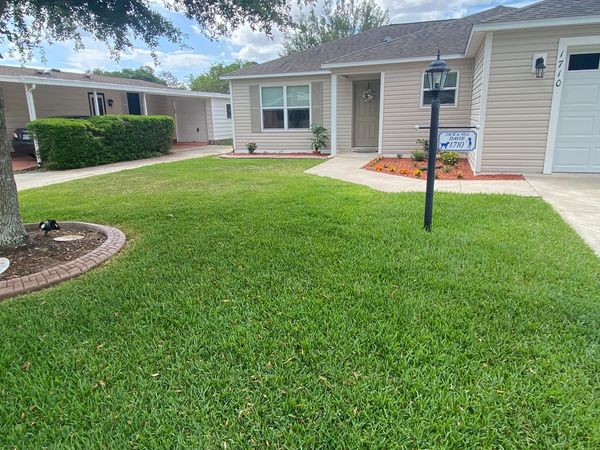 After: Remove unwanted garden, and replace with St. Augustine grass.